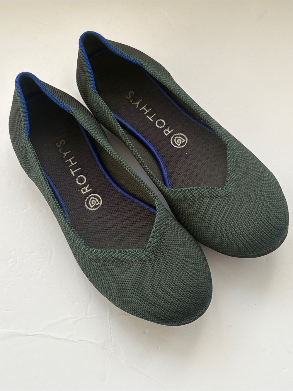 Rothy’s the flat emerald green round toe slip on shoes, size 10